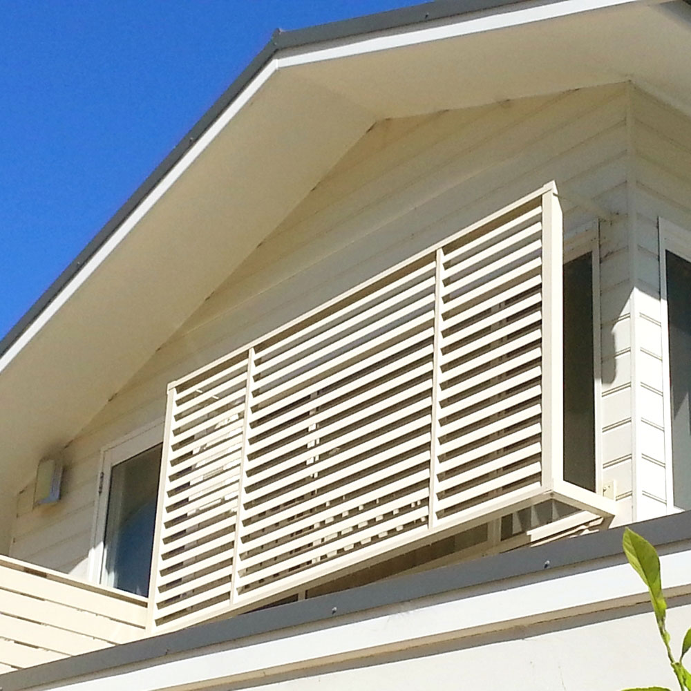 85mm privacy louvre installed with stand-off brackets in front of an upstairs window.