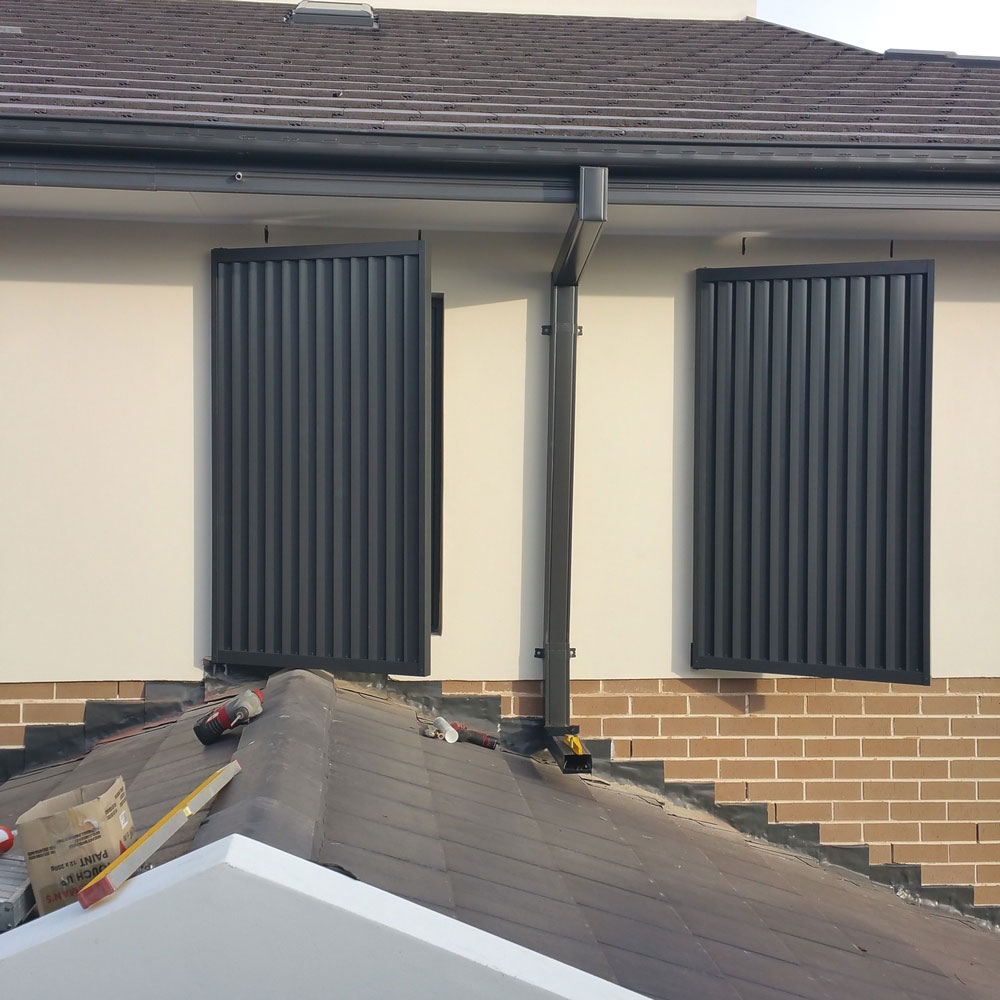 Vertical louvres installed at a 45-degree angle off the wall.