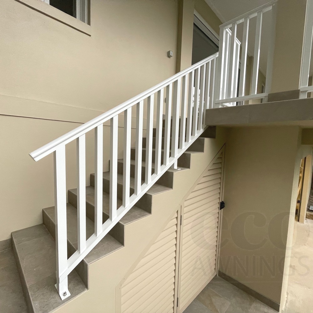 Aluminium handrails with vertical 40x40 battens on balcony and stair landing