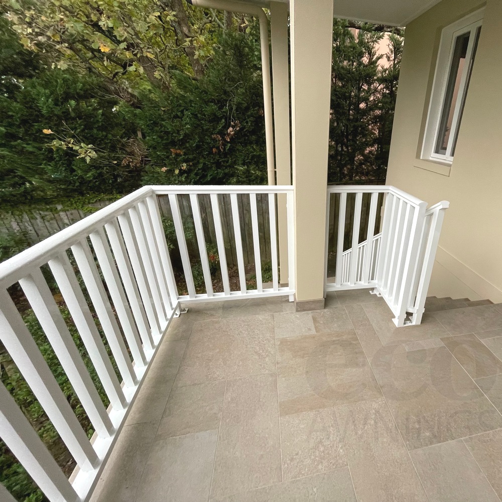 Aluminium handrails with vertical 40x40 battens on balcony and stair landing
