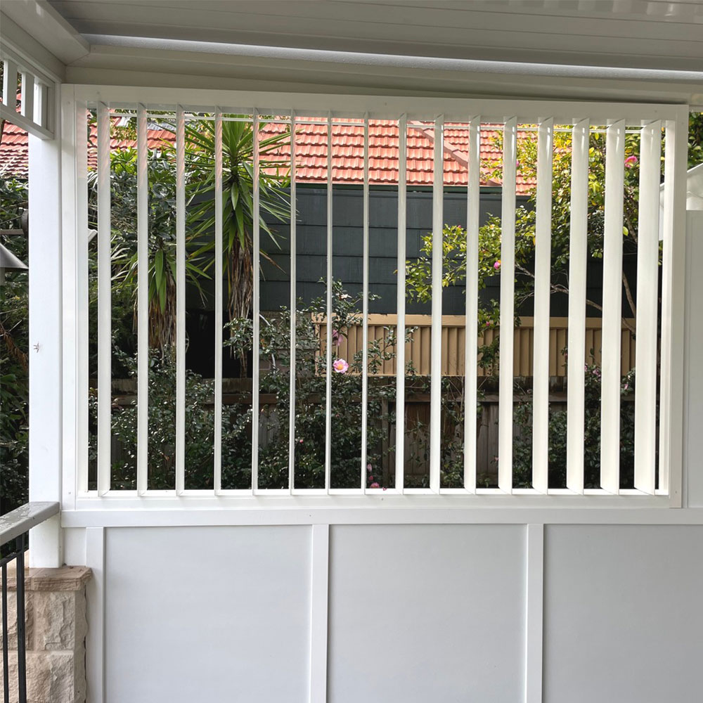 vertical louvres on the side of a balcony